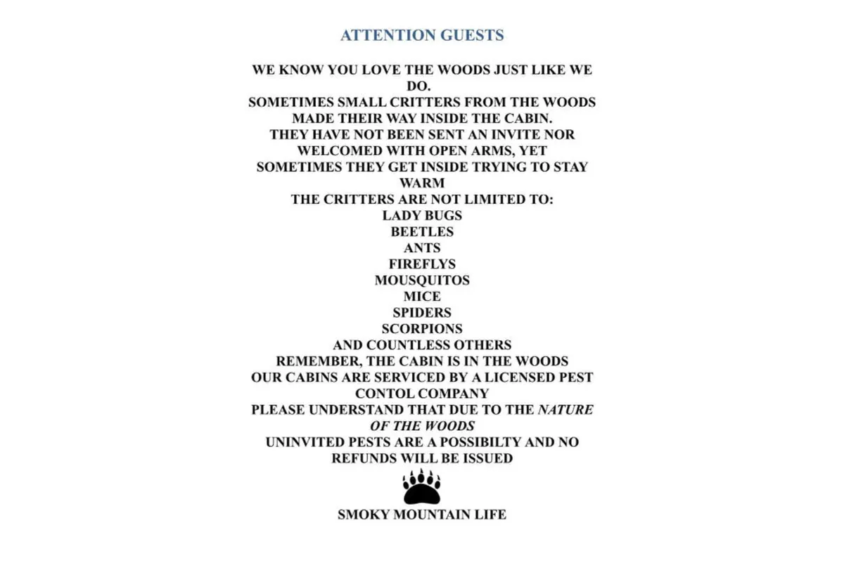 This image features an informative sign inside a wooden cabin adorned with nature-themed decor, creating a connection between indoor comfort and the natural surroundings. The playful, cautionary sign hints at wildlife encounters and outdoor adventures typical of Smoky Mountains getaways.